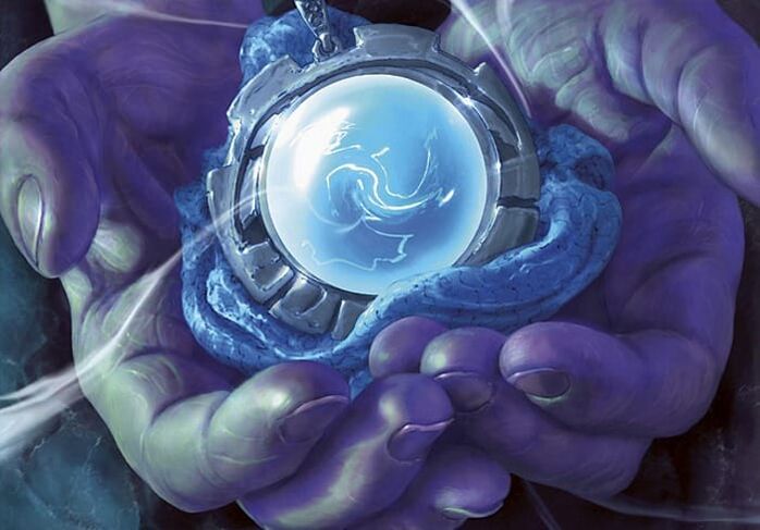 amulet magjik në duar dhe karikimi i tij